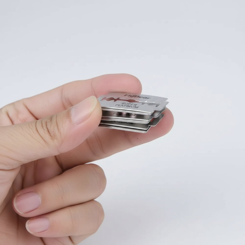 Professional-grade stainless steel double-edged manual razor designed for barbering and hair styling applications.
