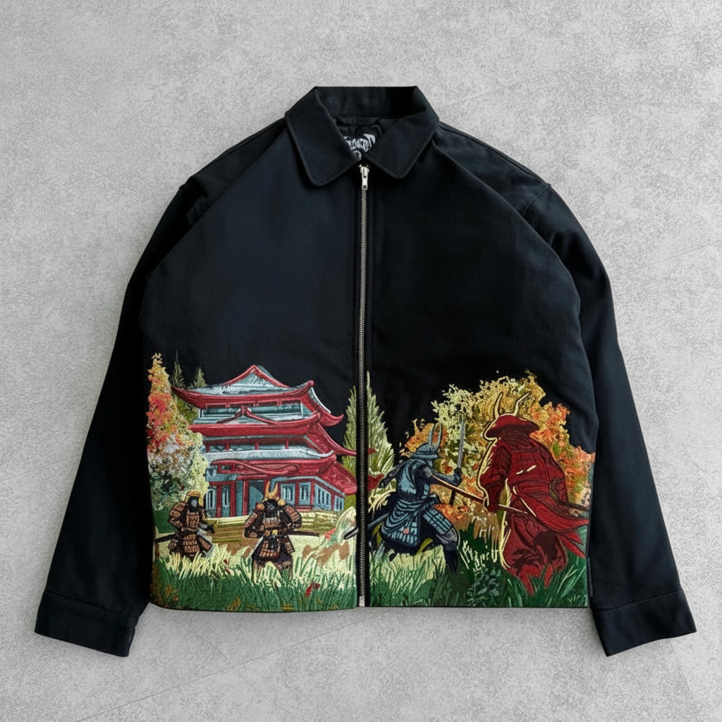 Black jacket with artistic designs of samurai and a temple on a gray background, featuring 'Block 27 Store' branding.